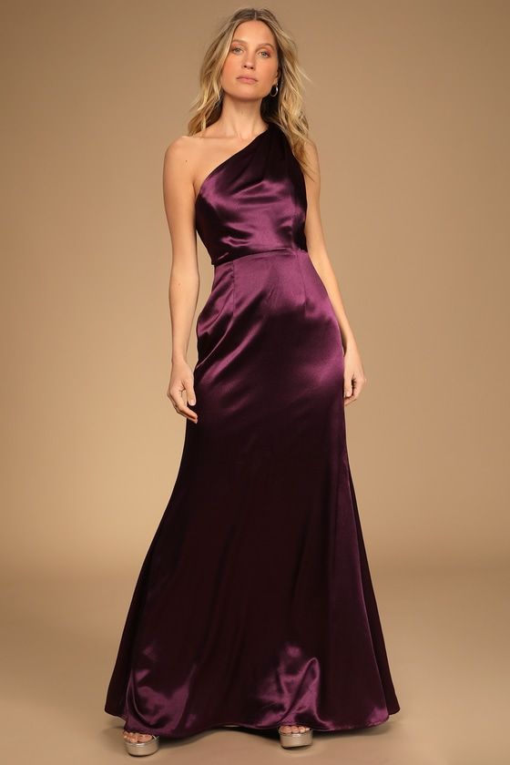 a woman in a long purple dress