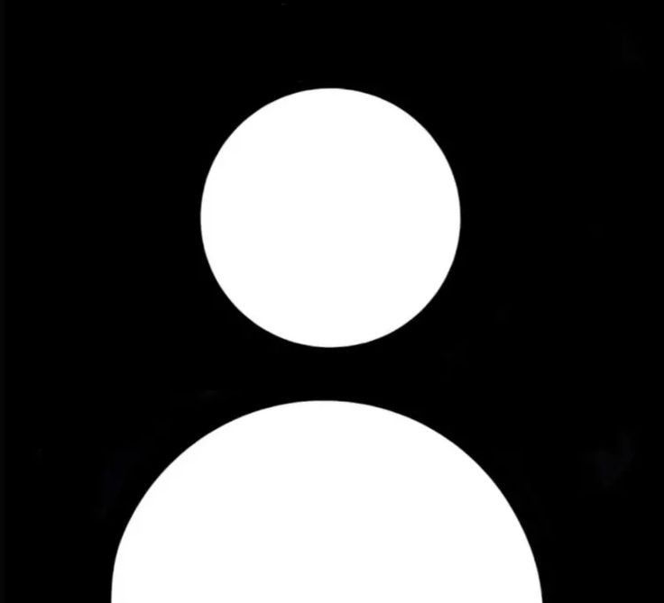 a black and white photo with two circles in the shape of a man's head