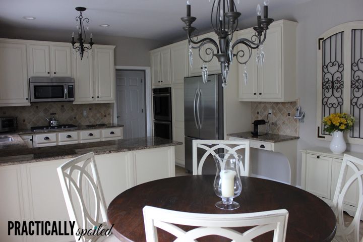 a dining room table and chairs in a kitchen