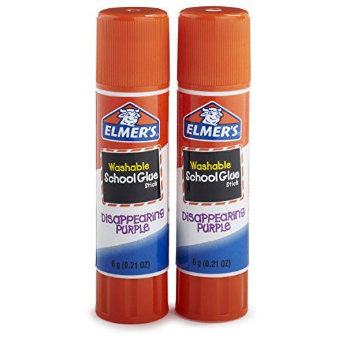 two bottles of school glue sitting next to each other