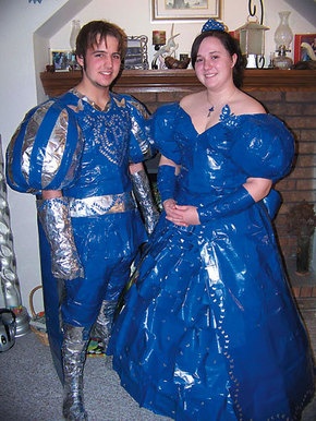 two people dressed in costumes standing next to each other