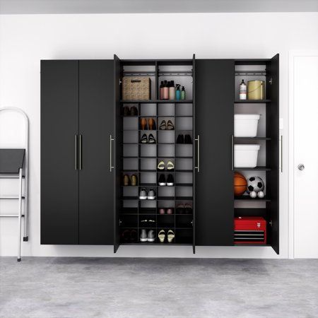 an organized closet with shoes and other items on shelves in a white walled room next to a chair