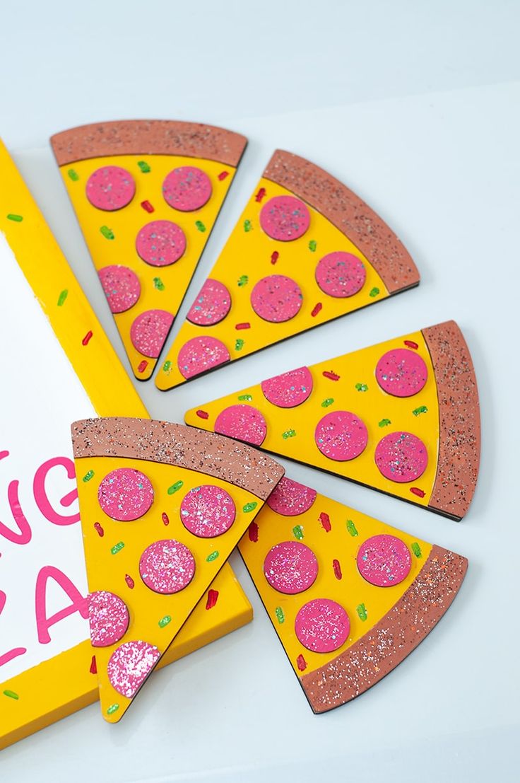 the pizza is cut into slices and placed next to a card that says giving pizza