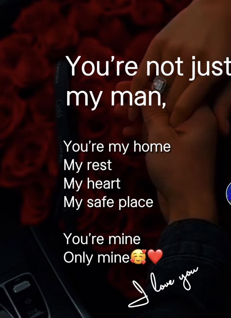 someone is holding their hand in front of a red rose with the words you're not just my man