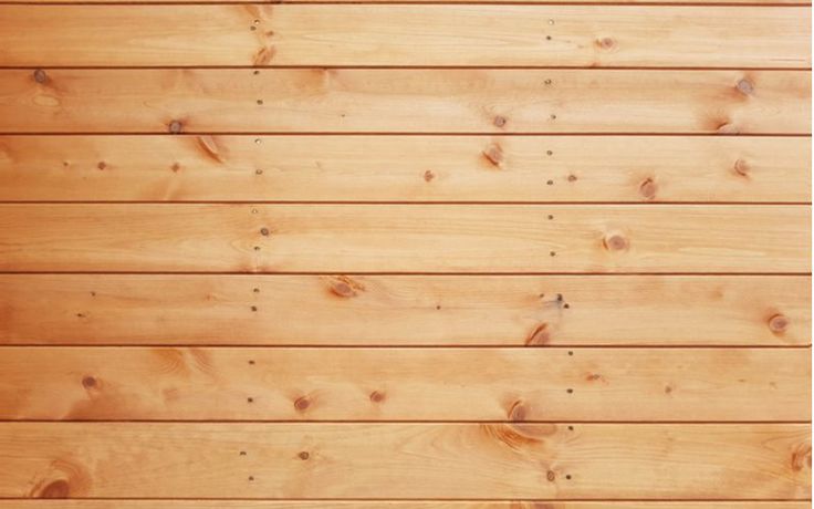 wood planks are arranged in the shape of a wall or flooring paneled with horizontal lines