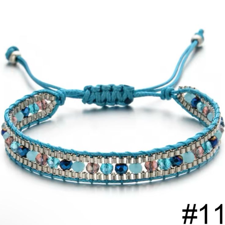 a blue string bracelet with beads on it