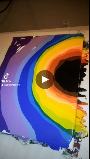 a book with an image of a rainbow swirl on the cover and title text that reads tiktok