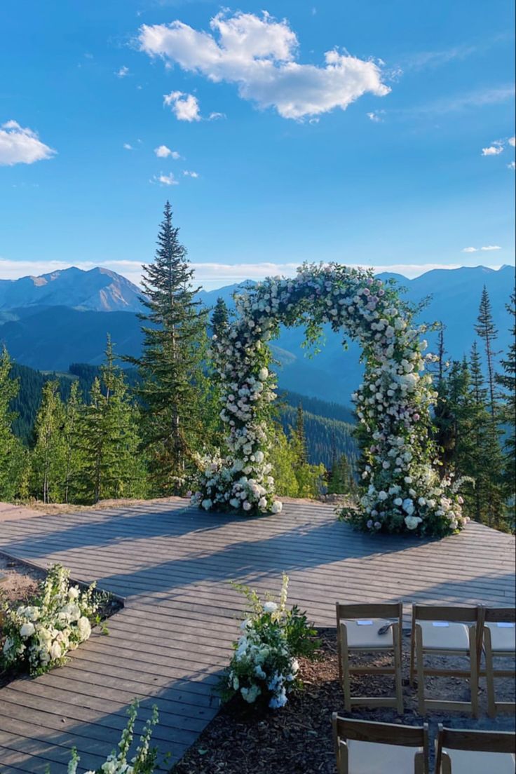 an outdoor ceremony set up in the mountains