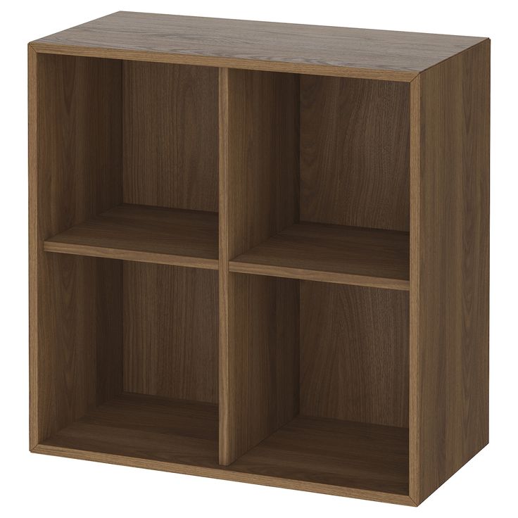 a wooden shelf unit with three compartments