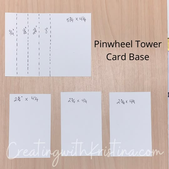 four pieces of paper with numbers on them