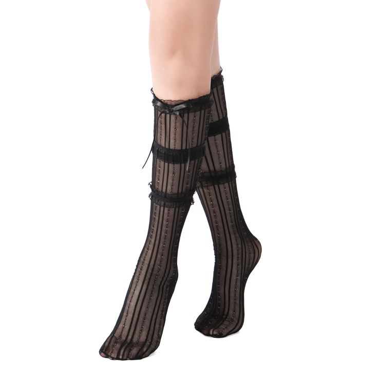 Prepare for a dreamy journey alongside Chloe! These black semi-sheer socks are the ideal choice for infusing a hint of romance into your outfit. Featuring a three-layered delicate lace trim in a knee-high silhouette, embellished with a charming satin bow that adds a touch of sweetness. The subtle striped pattern, woven with glistening metallic threads adds a bold twist. Crafted from a supple blend of nylon and spandex, they feature an elastic collar that ensures a snug fit. Whoever said we could Trendy Black Cotton Knee-high Socks, One Size Black Knee-high Socks, Black Lace Knee High Socks, Black Knee-high Nylon Socks, Black Stretch Nylon Knee-high Socks, Mesh Socks, Sheer Socks, Knee High Socks, Metallic Thread