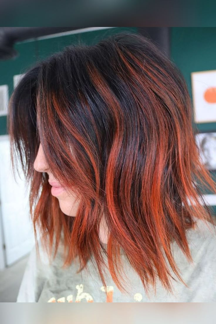 Burnt Orange Highlights On Brown Hair, Low Maintenance Vivid Hair Color, Dark Hair Orange Highlights, Fall Bayalage Hair, Bright Orange Highlights In Brown Hair, Red Orange Highlights In Brown Hair, Dark Hair With Orange Highlights, Brown Hair With Orange Tips, Vivid Highlights Brown Hair