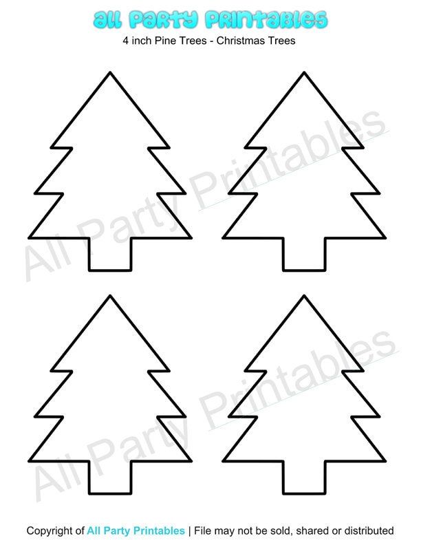 four christmas trees cut out from paper to make them look like they are in the shape of