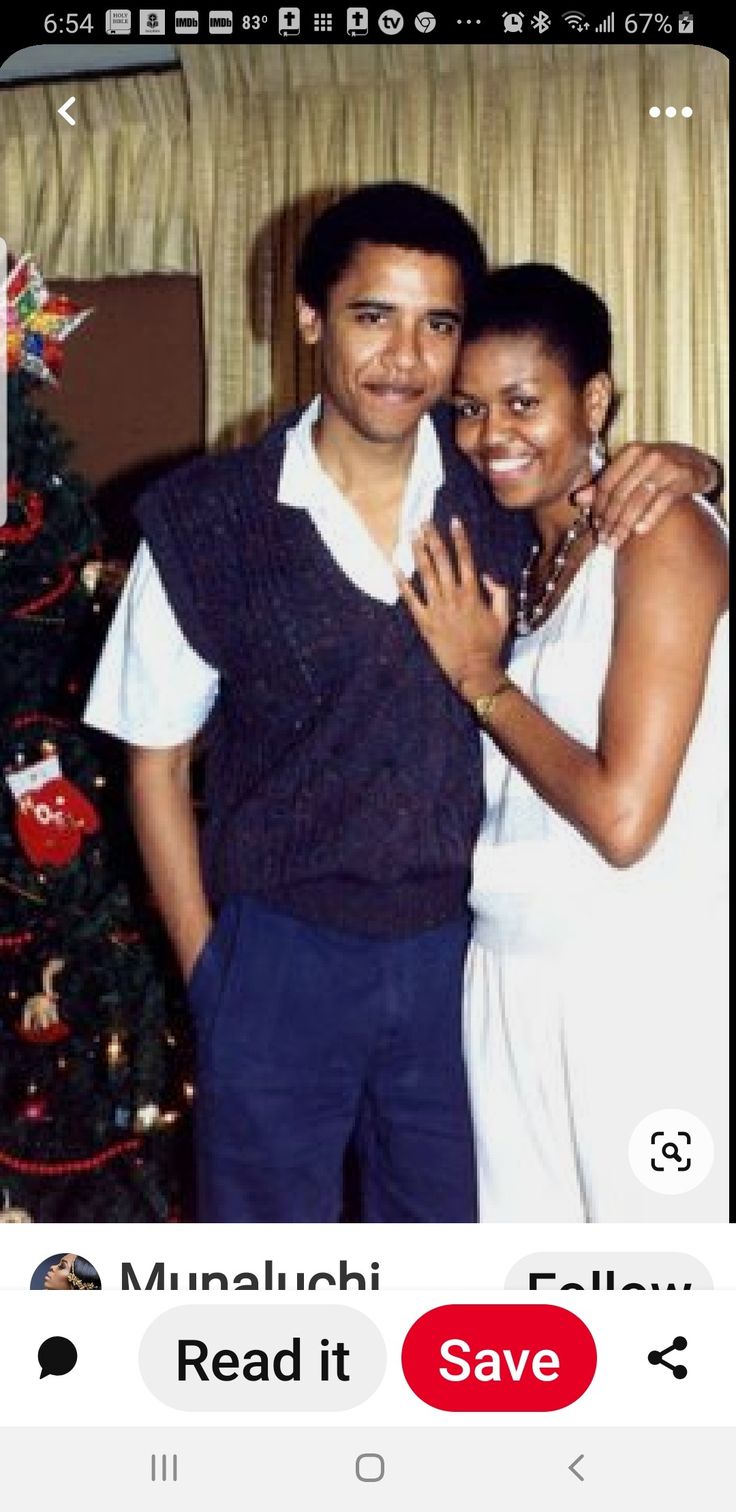 a man and woman standing in front of a christmas tree with the caption read it save