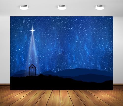 an empty room with wooden floors and a wall mural depicting the birth of jesus in the night sky