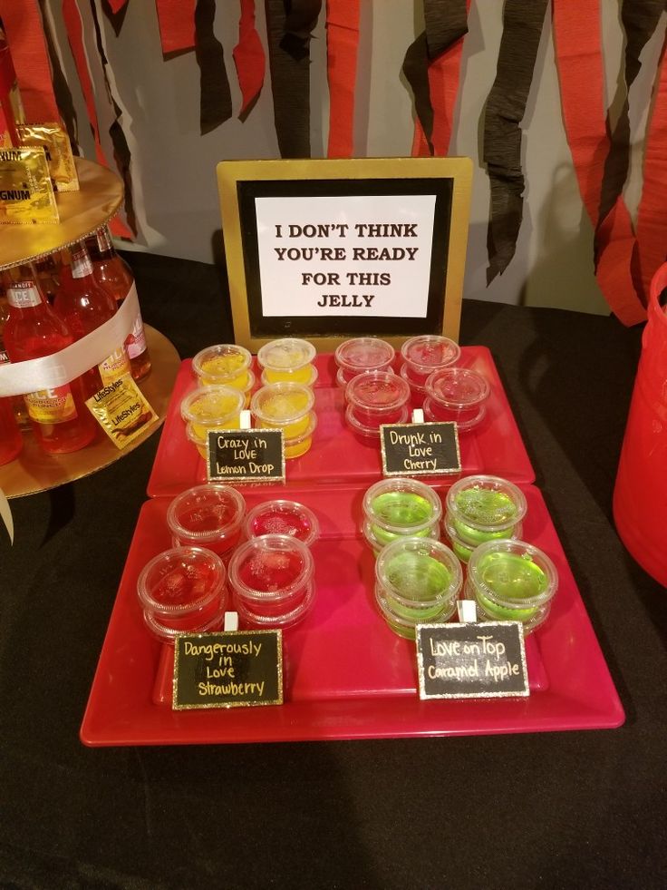 there are many cups on the table with signs in front of them that say i don't think anything is good for this jelly