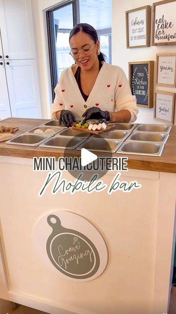 a woman standing in front of a counter with food on it and the words, mini chaquetrie maple lane