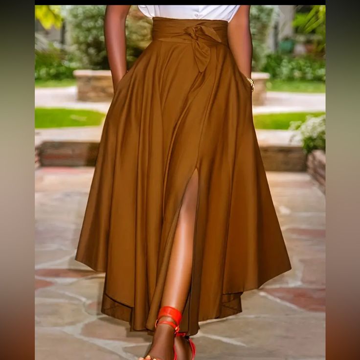 New Brown Maxi Luxury Tiered Skirt Midi Dress For Daywear, Chic Asymmetrical Solid Color Skirt, Chic Asymmetrical Skirt In Solid Color, Brown Asymmetrical Maxi Skirt For Spring, High Waist Flowy Brown Skirt, Chic Brown Skirt With Pockets, High Waist Solid Color Skirt For Day Out, Chic Brown Full Skirt, Elegant Brown Asymmetrical Skirt