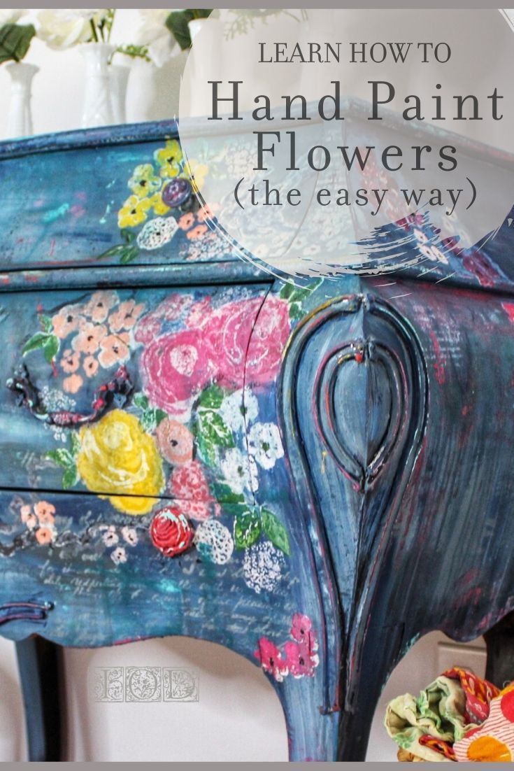 a blue painted dresser with flowers on it and the words learn how to hand paint flowers the easy way