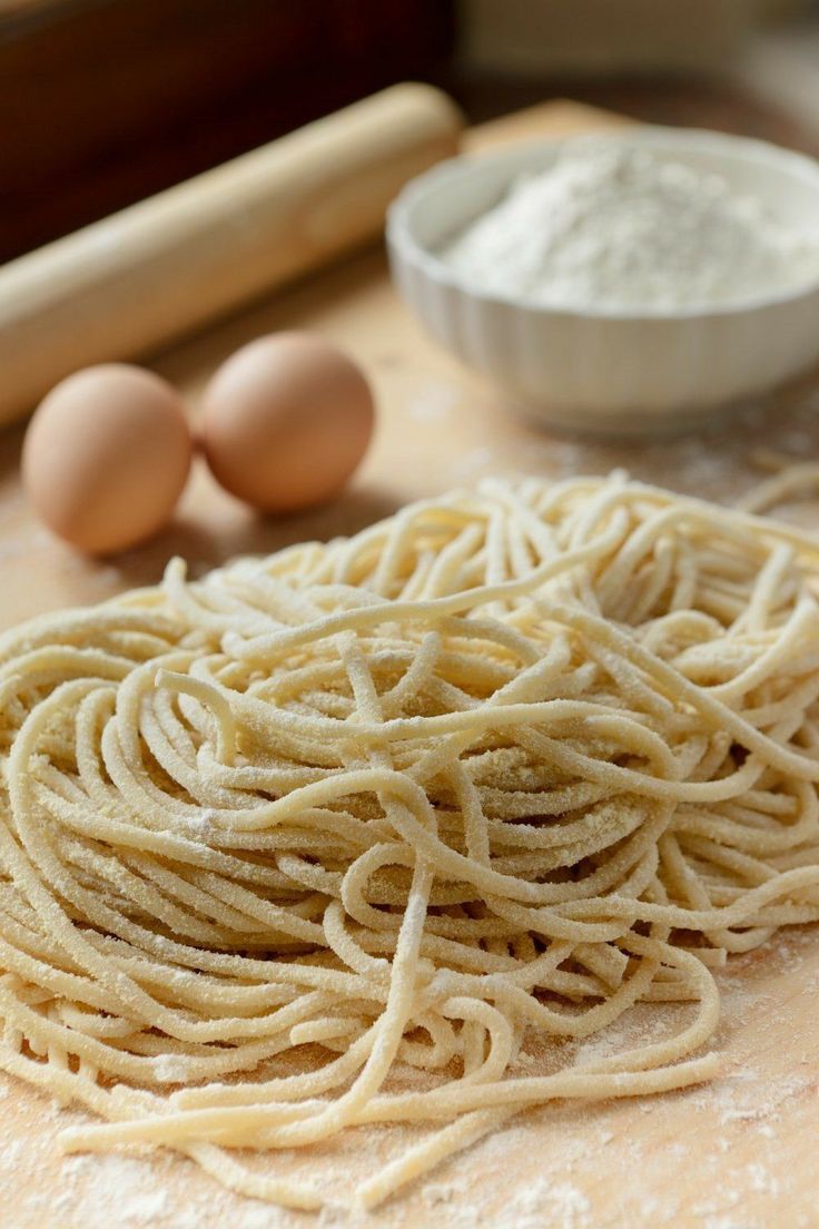 some noodles and eggs on a table