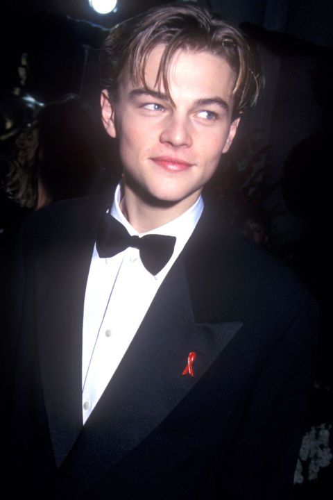 a young man in a tuxedo and bow tie