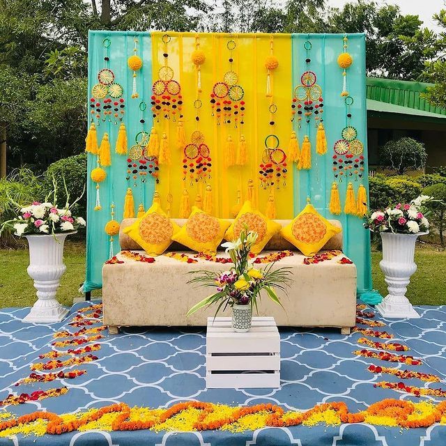 a decorated stage with yellow and blue decorations