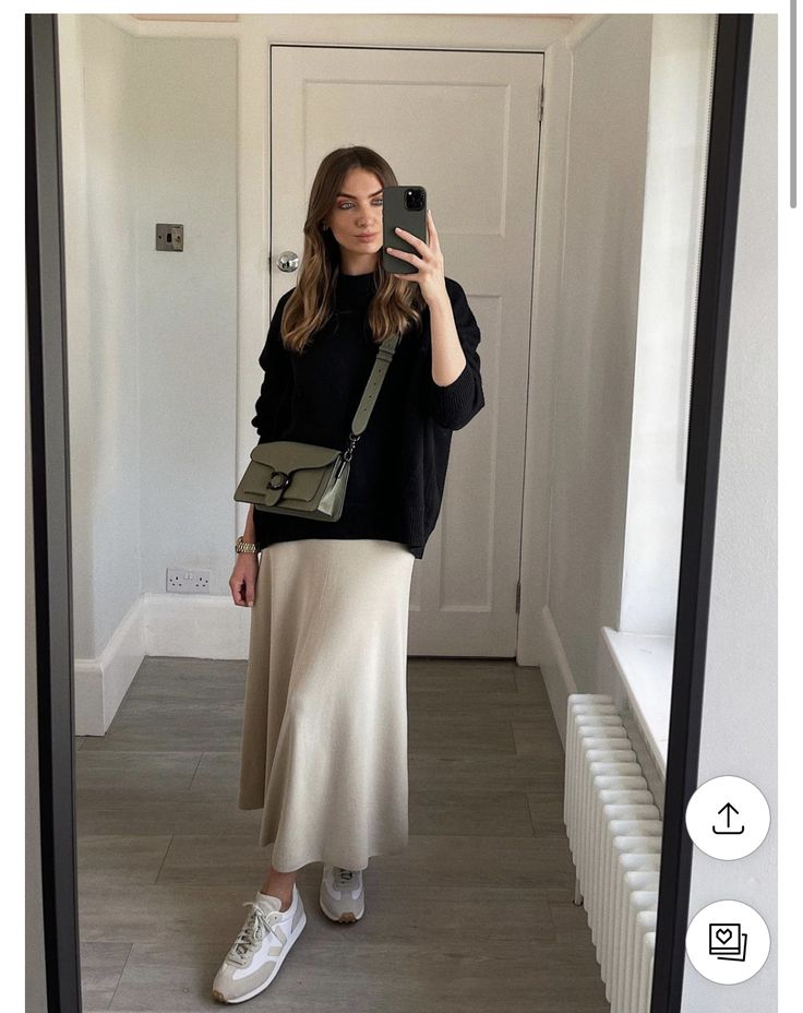 Aritzia Midi Skirt, Cream Silk Skirt Outfit Winter, Satin Skirt Sweatshirt, Taupe Satin Skirt Outfit, Aw23 Fashion Trends Women, Soft Chic Style, Satin Skirt And Shirt Outfit, Knit Maxi Skirt Outfit Winter, Satin Beige Skirt Outfit