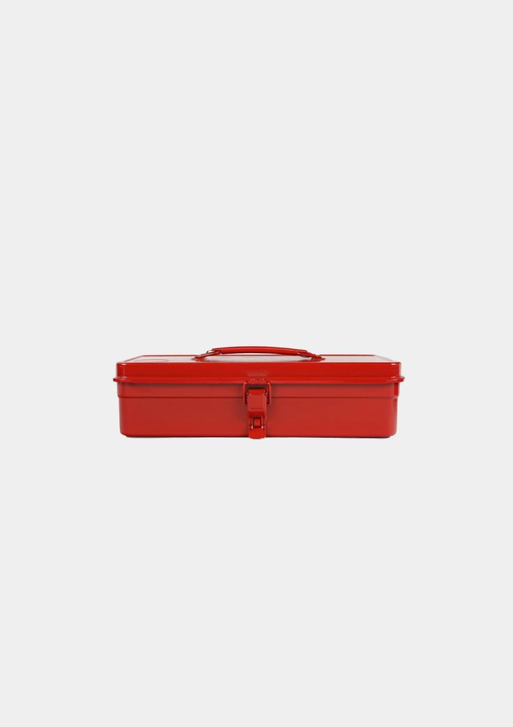 a red box with a handle on the top and two handles at the bottom, in front of a white background