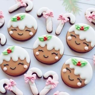 decorated cookies are arranged on a table