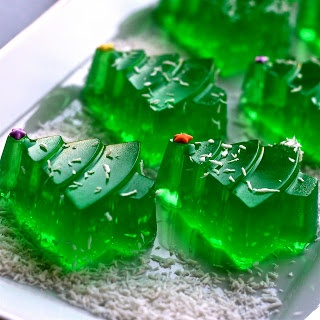 several pieces of green candy sitting on top of a table