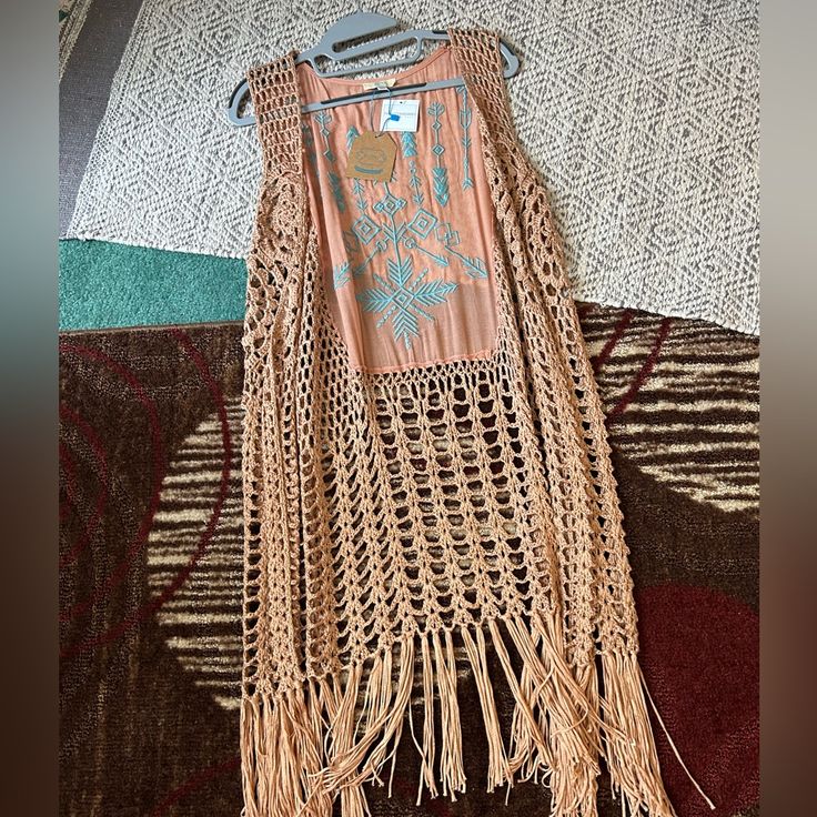 This Is A Knee-Length (Depending On Height- I’m 5’3”) Vest With Fringe. The Color Is Coral/Orange With A Turquoise Blue Embroidered Back. New! Wrap Front Sweater, Suede Fringe Vest, Flannel Tunic, Boho Style Tops, Ruffle Long Sleeve Blouse, Hooded Flannel, Fringe Vest, Long Sleeve Floral Top, Short Sleeve Hoodie