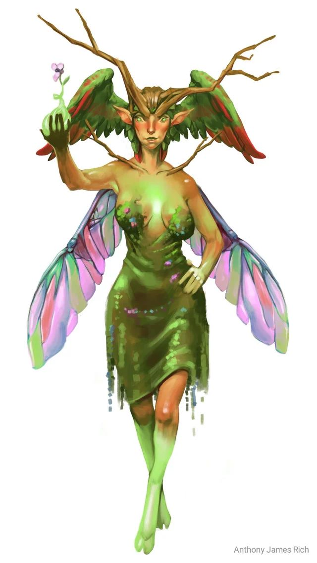 a woman dressed as a fairy with wings on her head and hands in the air