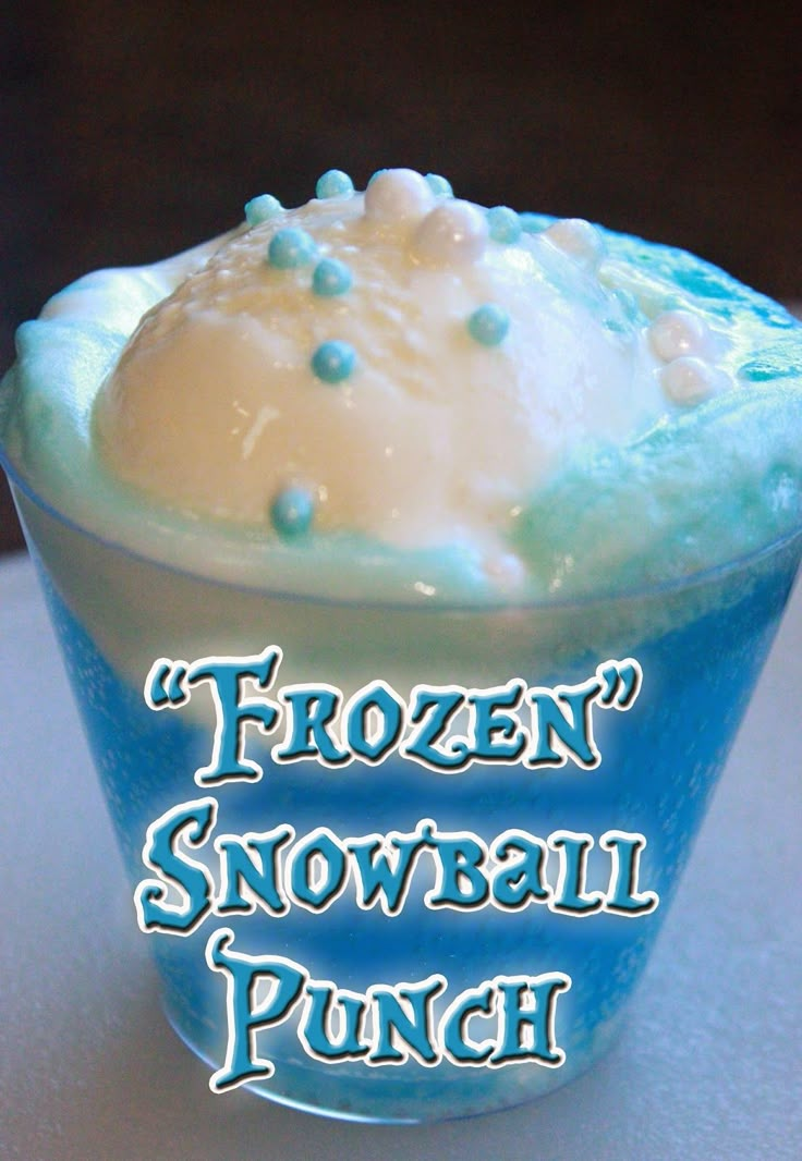 frozen snowball punch cupcake with frosting and sprinkles on top