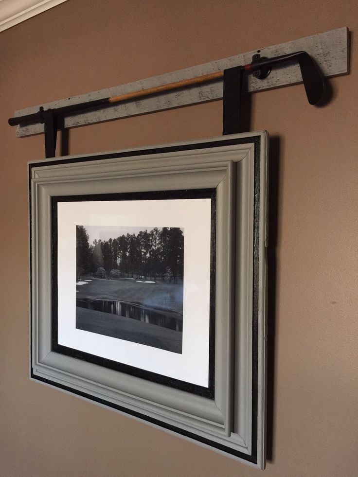 a framed photograph hanging on the wall