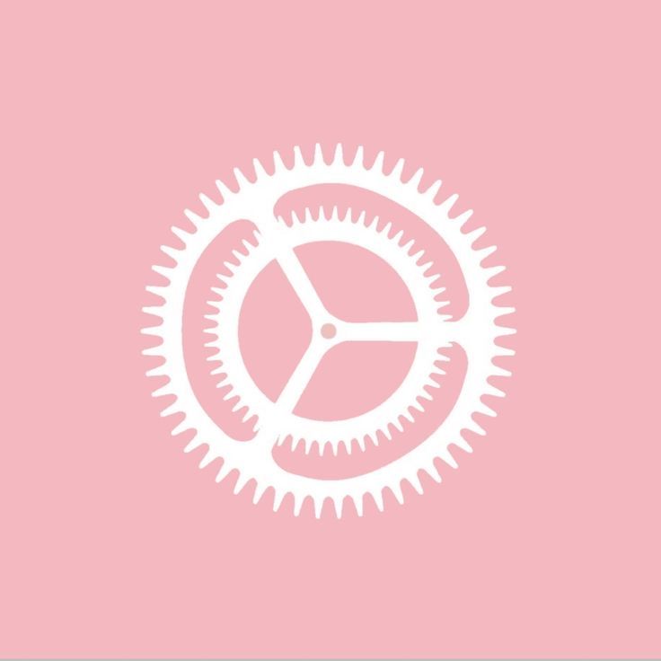 a pink background with an image of a gear wheel on the bottom right hand corner