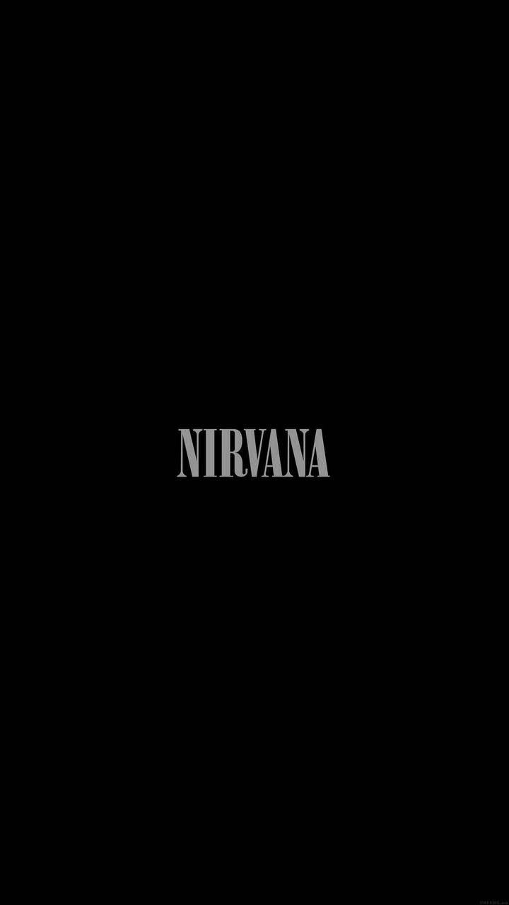 the word nirvana is written in black and white on a dark background with an airplane flying overhead