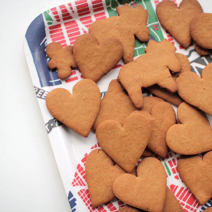 some heart shaped cookies are on a tray