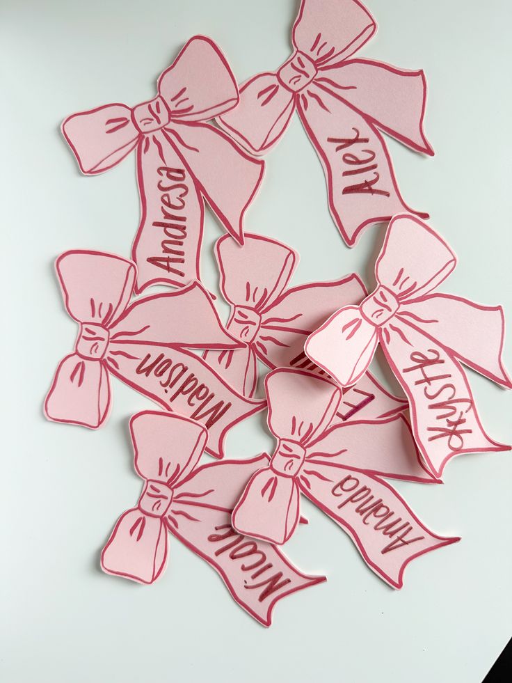 pink bows with happy birthday written on them