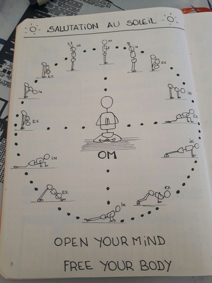 an open notebook with instructions on how to do yoga