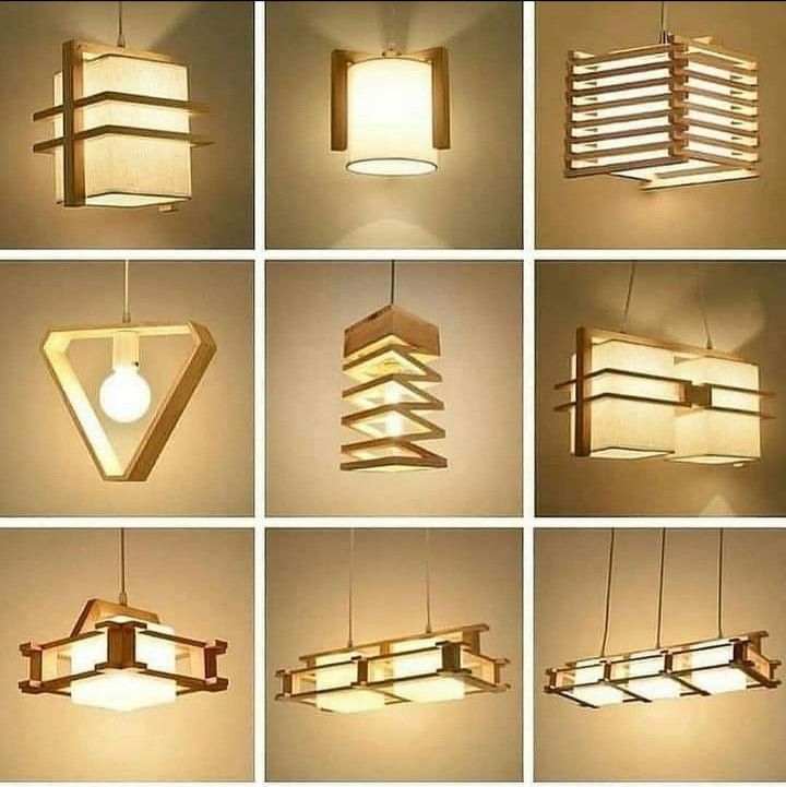 several different types of lights hanging from the ceiling and in front of them are pictures of lamps made out of cardboard boxes