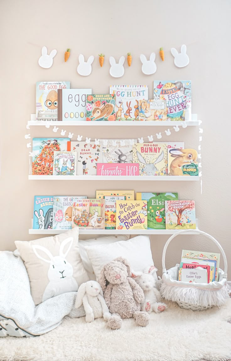 a child's bedroom with bookshelves and stuffed animals