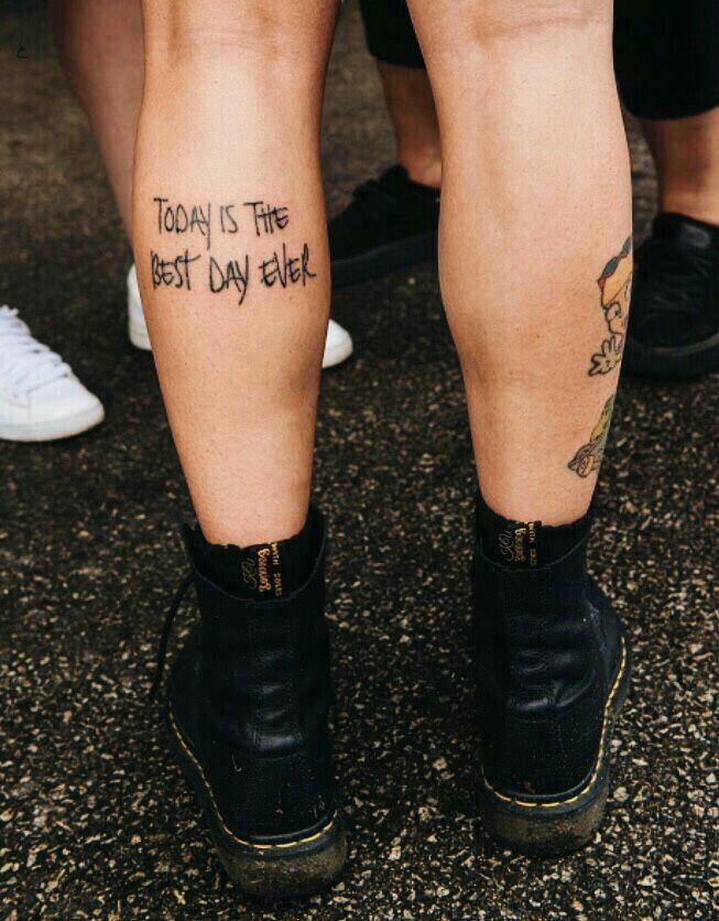 two people with tattoos on their legs and one has the words today is the best day ever