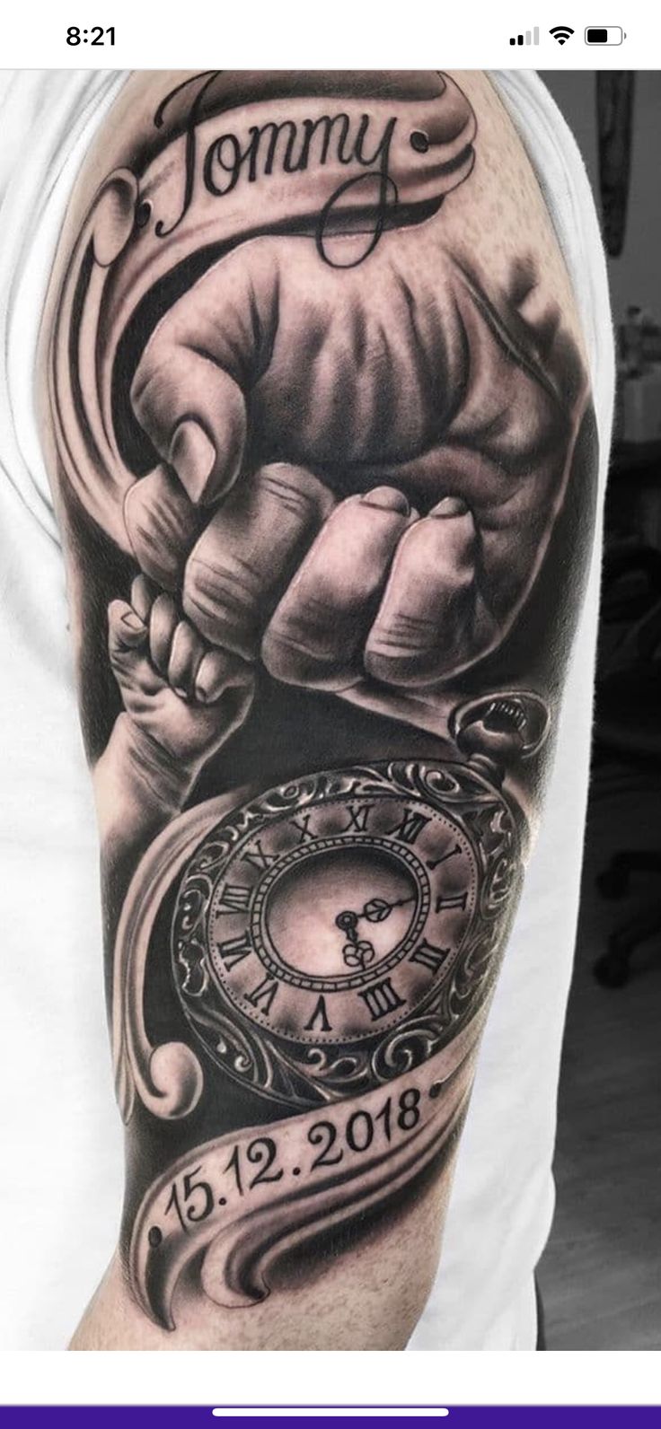 a man's arm with a clock on it and the words tommy written in roman numerals