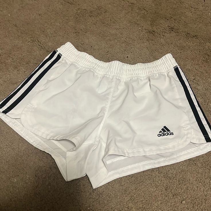 Nwot Adidas Shorts. Comfy. Athletic. Perfect Condition. Size Xs White Three Stripes Athletic Shorts For Sports, White Three Stripes Athletic Shorts, Adidas Sporty White Athletic Shorts, White Shorts With Three Stripes For Spring, White Three Stripes Shorts For Spring, White Adidas Sports Shorts, White Athleisure Shorts With Three Stripes, White Stretch Shorts With Three Stripes, Adidas White Athletic Shorts With Built-in Shorts