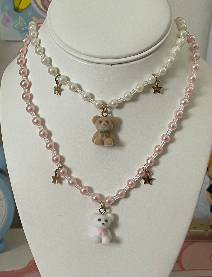 Teddy bear charm necklaces made with plastic beads. About 18 inches stretch cord necklaces. teddy pearls beaded kawaii cute aesthetic charms stars Easter basket gift Cheap Charm Necklaces With Beaded Chain And Round Beads, Cute Accessories Necklaces, Kawaii Necklaces, Jewelry To Sell, Pearl Necklace With Charm, Cute Beaded Charm Necklaces, Bear Accessories, Cute White Pearl Beaded Necklaces, Pretty Accessories