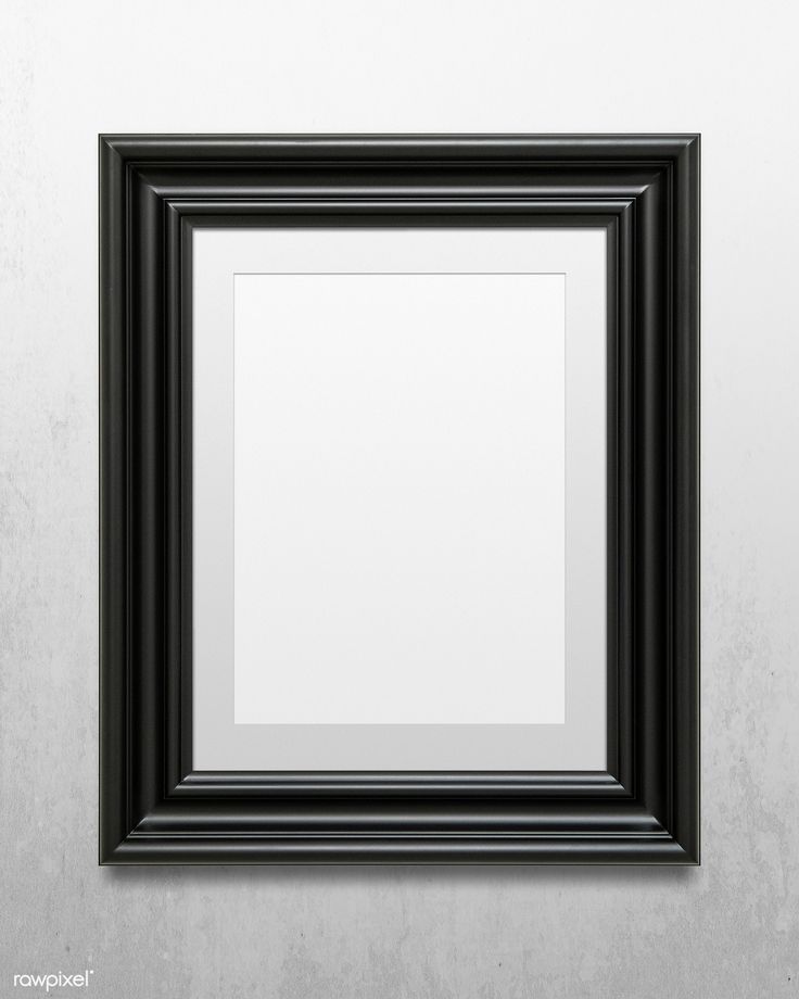 an empty black frame hanging on the wall