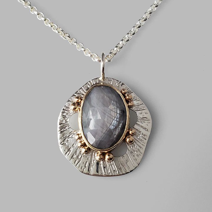 grey sapphire set in yellow gold on textured silver pendant with gold dots Silver Handmade Necklace, Copper And Silver Jewelry, Handmade Jewelry Silver, Handmade Silver Necklace, Silver Clay Jewelry Ideas, Silversmith Pendant, Silver Smithing Jewelry, Metal Clay Designs, Handmade Chain Jewelry