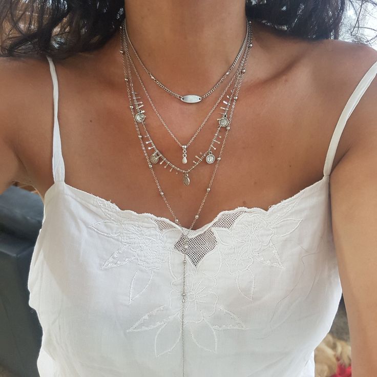 ♦ A multi-chain necklace, made of silver-plated brass in very high quality, The necklace is inspired by the boho chic and is designed in a chic style decorated with coins.        SIZE: length: 24 "( 62cm) 27.5" (70cm) The size refers to the bottom chain      coin size : 0.38"(1cm)          YOU CAN SEE MORE LAYER CHAIN DESIGN IN THE LINK: https://etsy.me/2TKMKPv ♦ This piece of jewelry is perfect as a gift for yourself, for a wedding day, Valentine's Day, Sea, Festival or      a birthday. Silver Layer Necklace, Long Drop Necklace, Layers Long, Lariat Necklace Silver, Layer Chain, Silver Coin Necklace, Boho Chic Design, Multi Chain Necklace, Layered Necklaces Silver