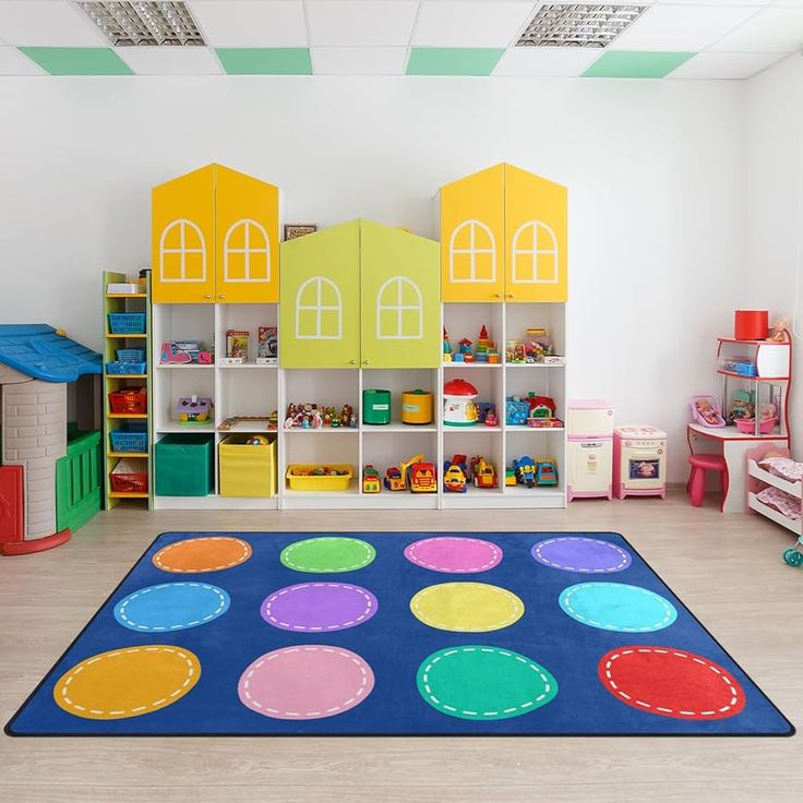 a child's play room with toys and colorful rugs