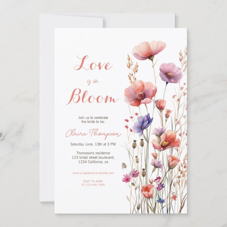 an elegant floral wedding card with pink and purple flowers on the front, in watercolor